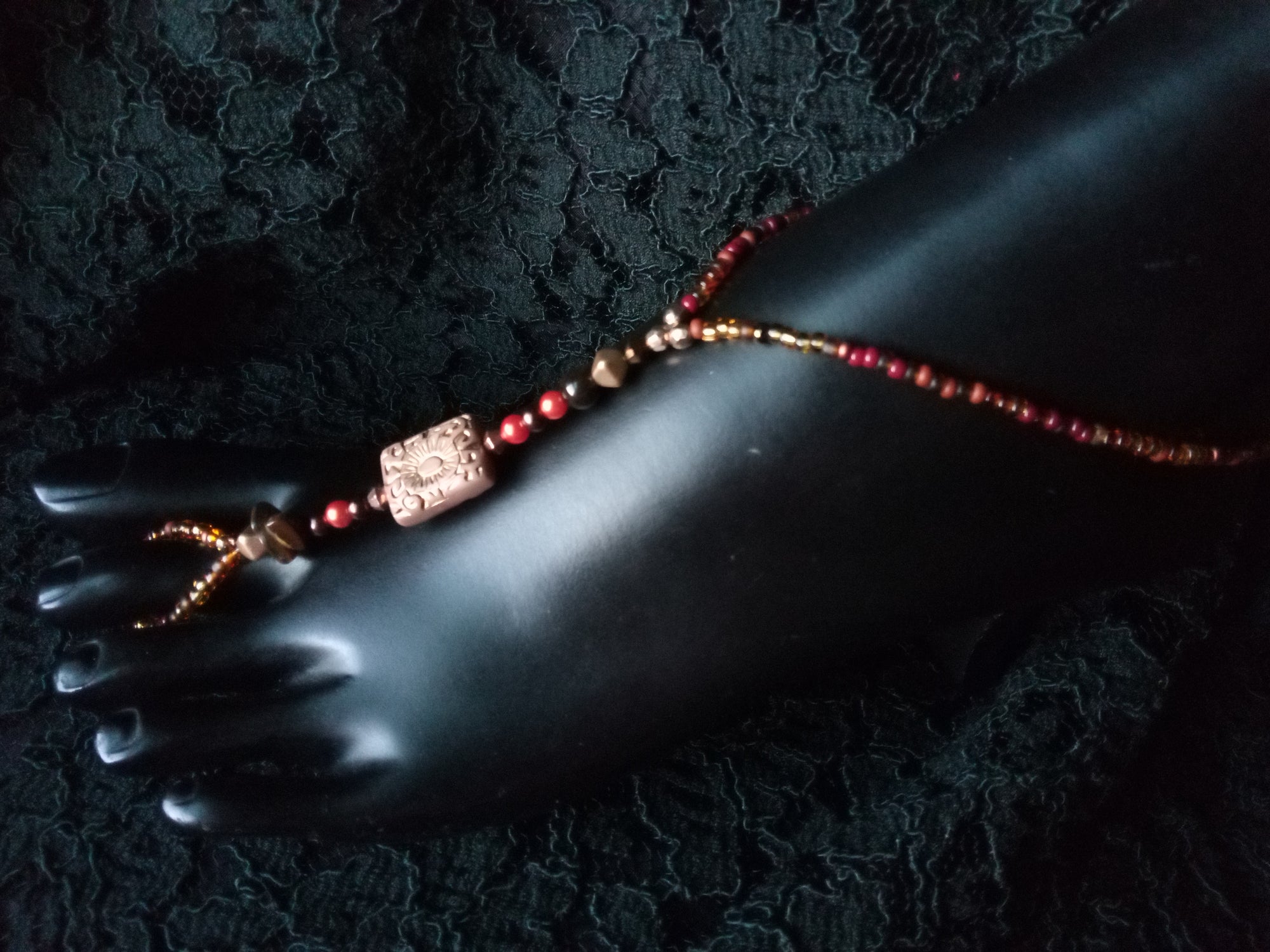 HER FEET IN THE SOIL ( TIGER EYE)