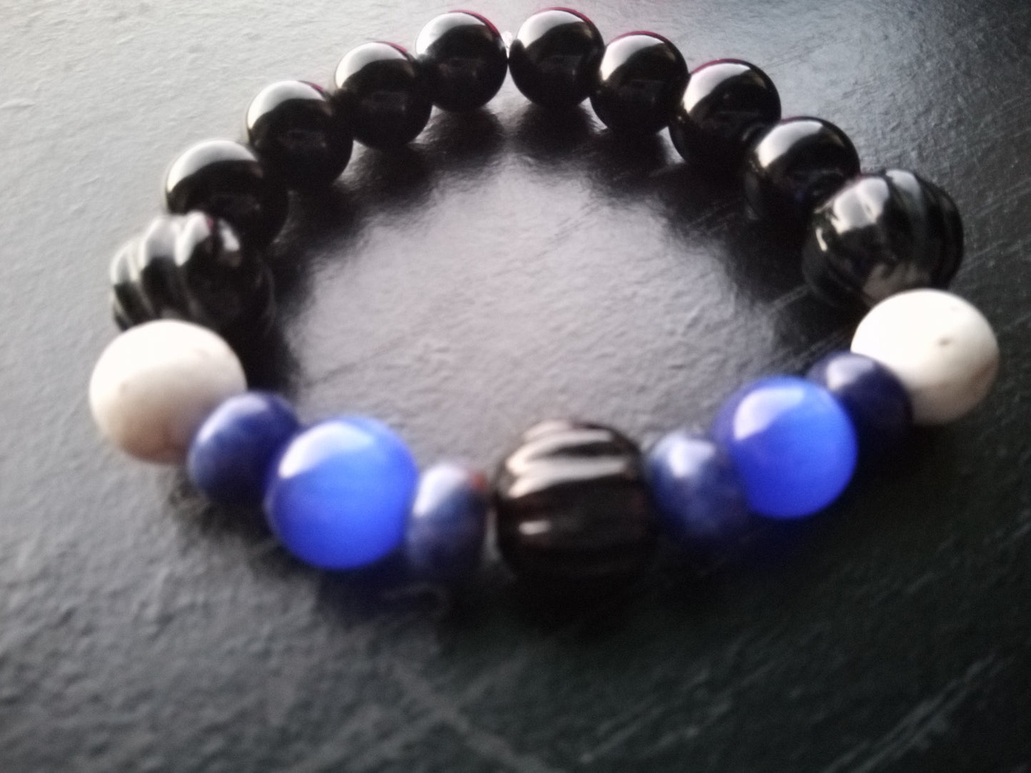 REALMS (sodalite, howlite ,cat eye  )